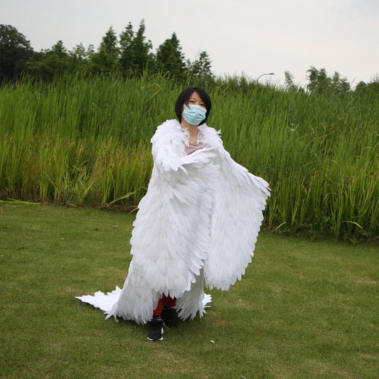 人気の白い羽の衣装 DIY パフォーマンス コスプレ ステージ小道具 結婚式の写真
